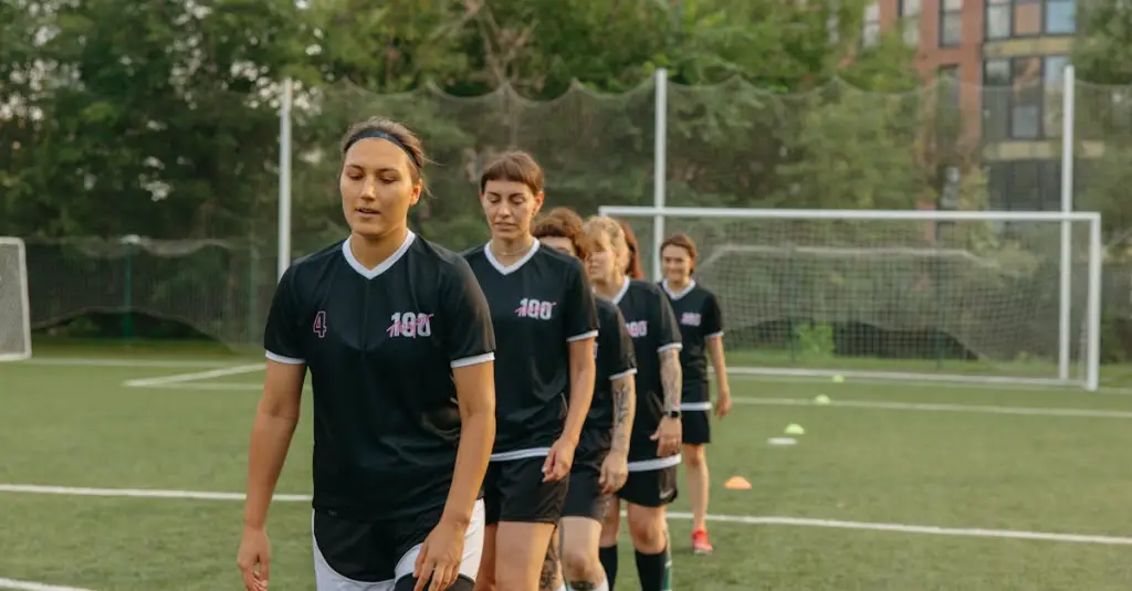 A female football player wearing a GPS tracking vest over her jersey, mid-sprint on a training pitch, focus on athletic form and speed, motion blur on legs, green grass background, realistic sports photography
