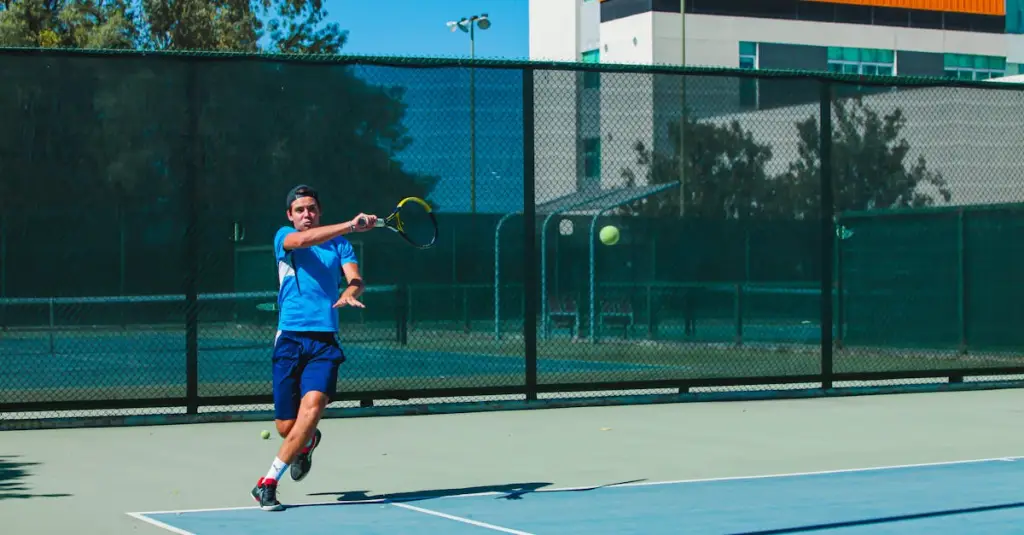 Professional tennis player hitting a powerful forehand on a red clay court at Roland Garros style stadium, red clay dust visible, topspin stroke, motion blur, realistic photography