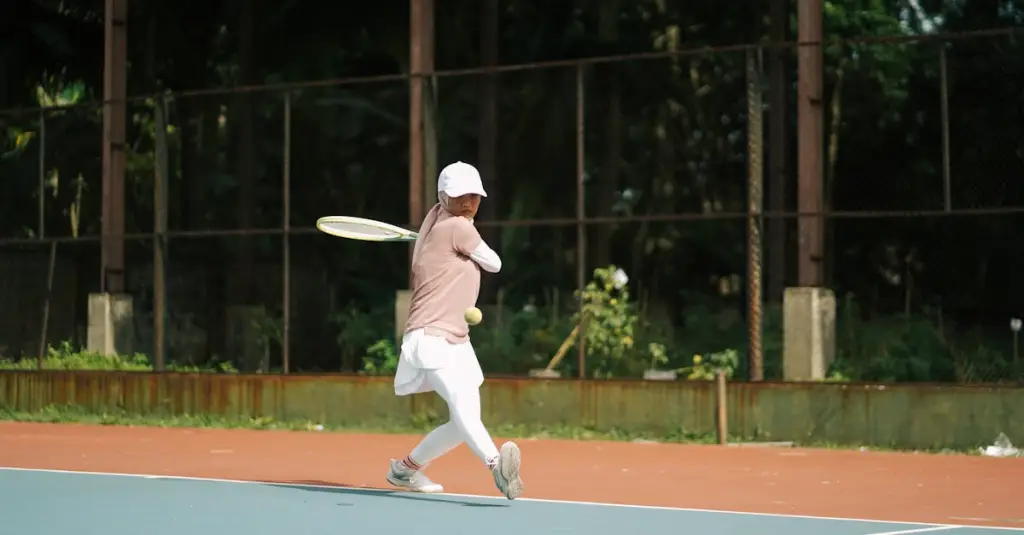 A tennis player performing sprint interval training drills on a hard court, cones marking distances, athletic training session, action photography with motion blur, outdoor sports facility