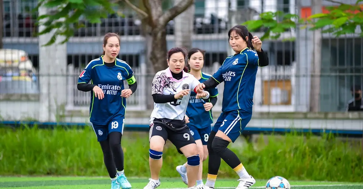 Female football player wearing GPS tracking vest pod between shoulder blades, close-up detail on training pitch, sports science technology, realistic photo